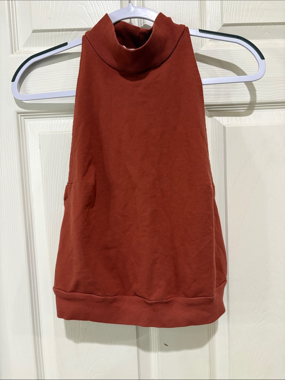 Anthropologie Sleeveless Mock Neck Tank Top in Rust with knotted back detail
